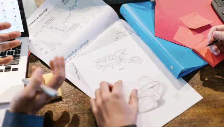 A photo of a group of people marketing and planning their crowdfunding campaign